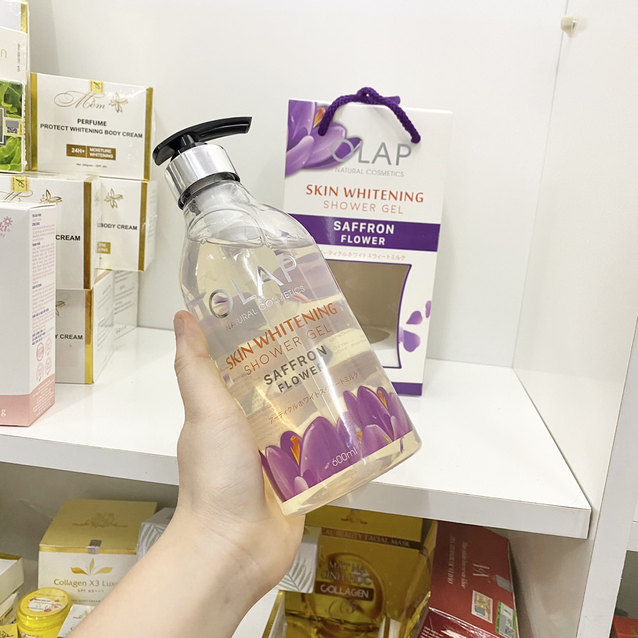 14805-z2940045971212-4779d232030df3ab432417c3d32e734f-6.jpg Sữa Tắm Trắng Da Olap French Màu Tím 600ml - 8938519955936