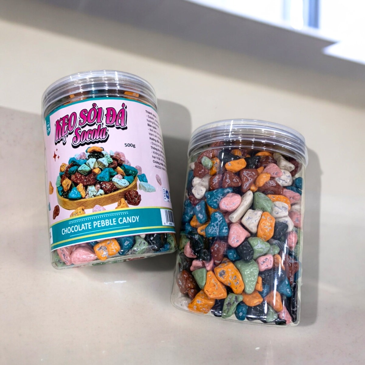 24452_z5494824046368-d2a3d29bd043ecbcaffc915f2d970e45-photoroom_20240601150022-4.png Kẹo Socola Sỏi Đá 500g - 8936208930424