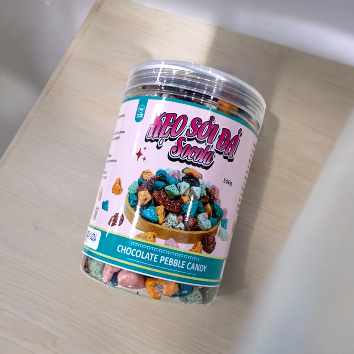 24452_z5494824448319-e623c5d2f337074bf7e199258538a17e-photoroom_20240601150023-4.png Kẹo Socola Sỏi Đá 500g - 8936208930424