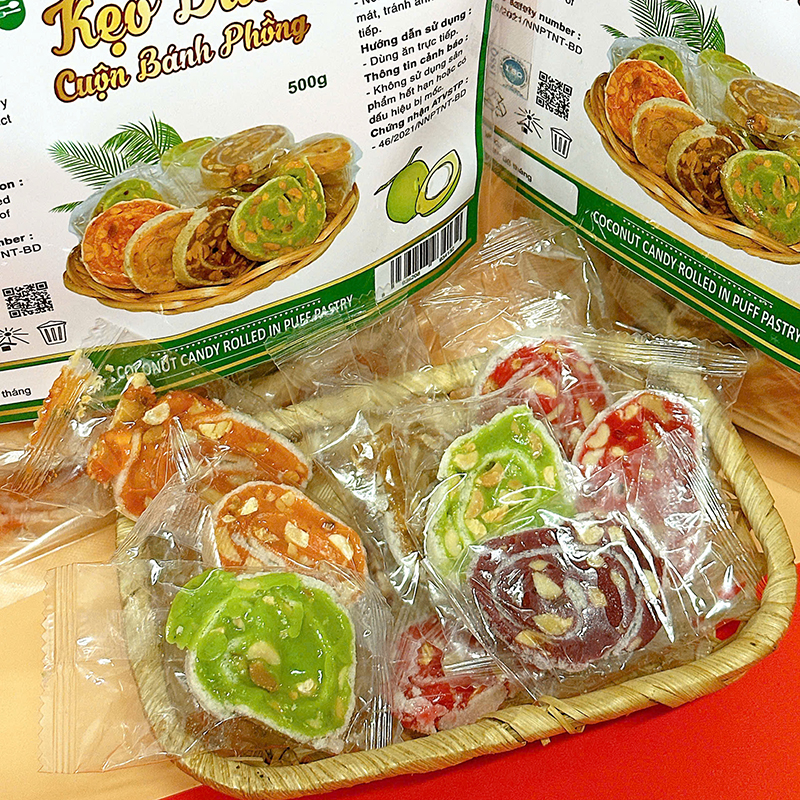 25875_z6125813347626-43a1f885918867730cdf9ca5875b4f3f_20241214151018-1.jpg Kẹo Dừa Cuộn Bánh Phồng Thơm Ngon Túi Zip 500g - KDCNP500