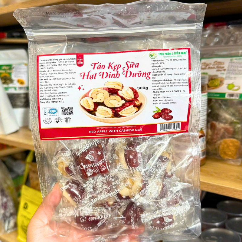 25878_55_20251204175119.png Táo Đỏ Kẹp Hạt Điều Túi Zip 300g - TDKHDTZ300