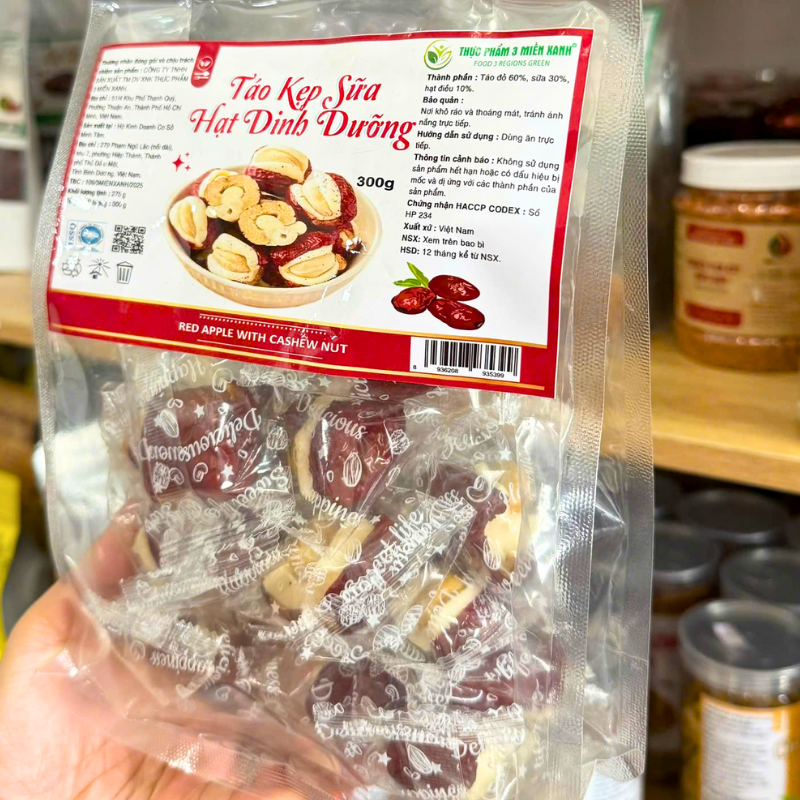 25878_56_20251204175119-2.png Táo Đỏ Kẹp Hạt Điều Túi Zip 300g - TDKHDTZ300