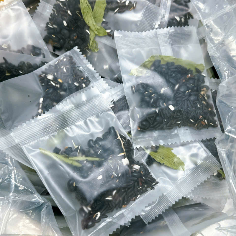 26305_4_20250422113212-3.png Trà Ngũ Hắc Mè Đen Túi Zip 150g 10 Gói - TNHMDTZ150G